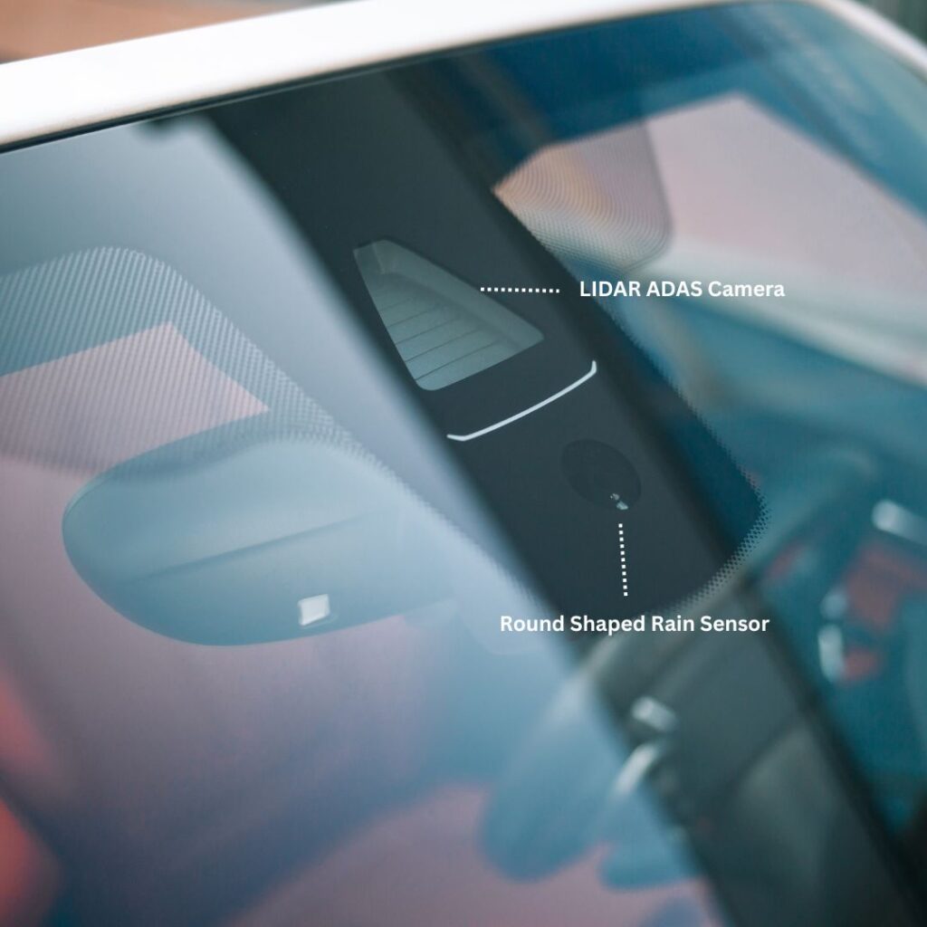 showcasing placement of LIDAS ADAS Camera and rain and light sensor on the back side of the mirror